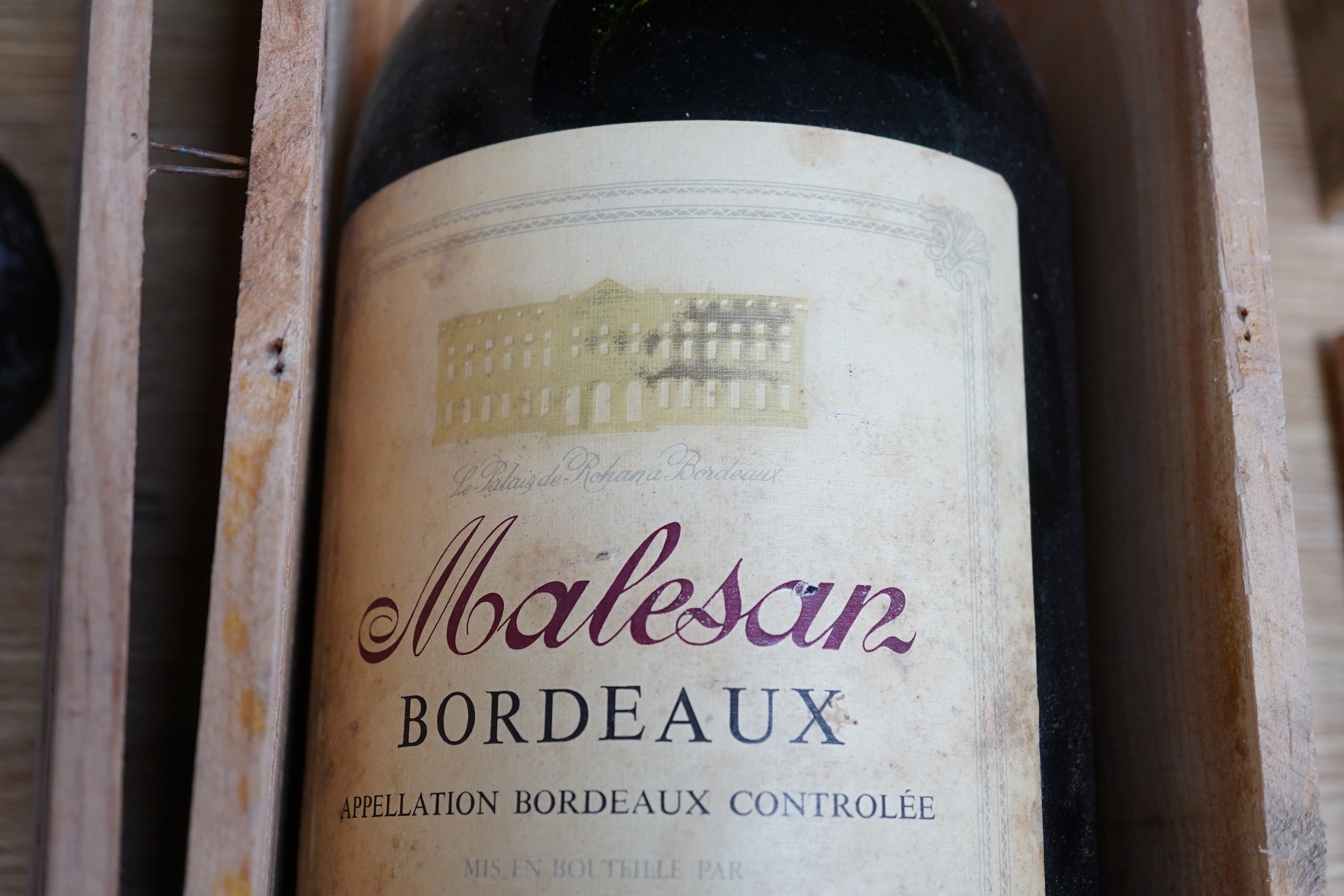 A 5 litre bottle of 1987 Malesan Bordeaux red wine in a wooden case, 50cm